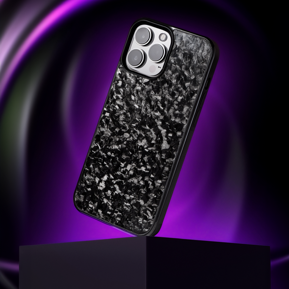 Floating black forged carbon fiber case, dramatic purple lighting